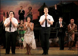 Cast members of the Book of Mormon on stage